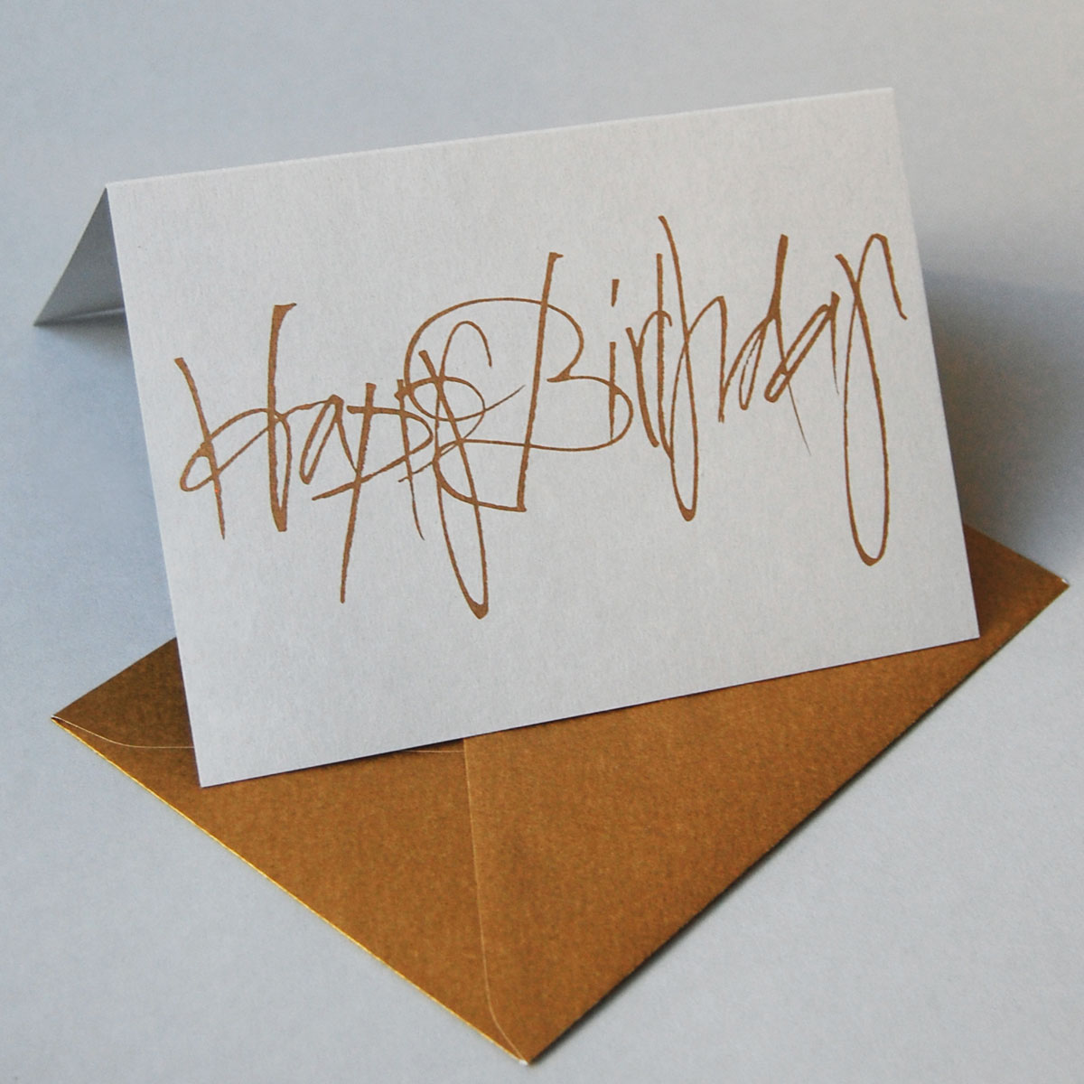 Eco-Friendly Greeting Cards with golden envelopes