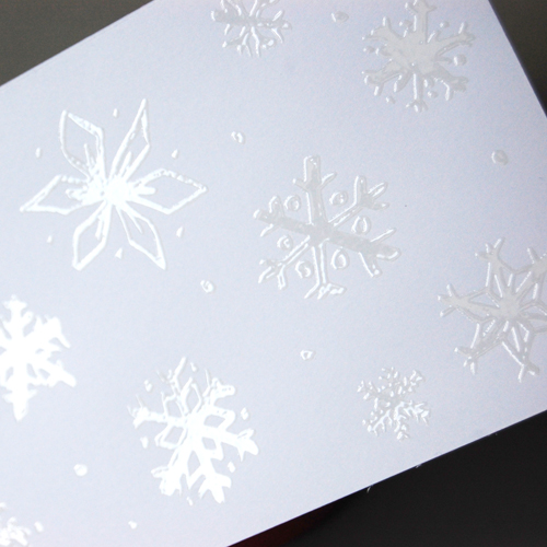 white Christmas Cards with relief-lacquer of snowflakes